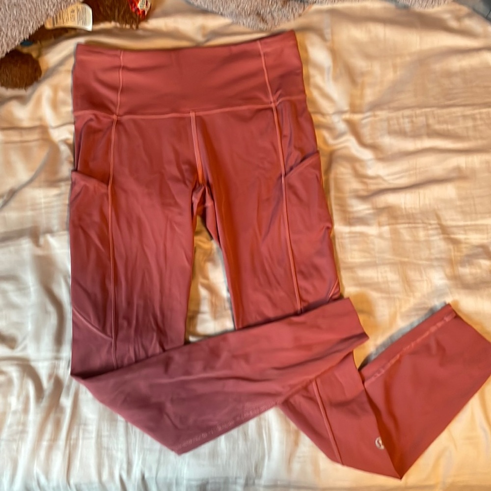 Pink Lululemon Align with pockets size 6